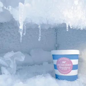 How often should the freezer be defrosted?