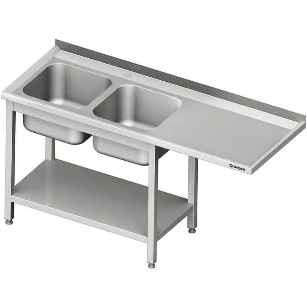 Table with 2  sinks, self and room for fridge or dishwasher